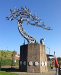 A riverside metal sculpture. All along the river walks are maps and commerative placques in honour of the once thriving ship building industry.