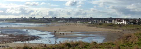 Lookig back at Roker and Seaburn beaches with Sunderland apartments in the background