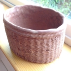 The basket removed before firing in a shared kiln