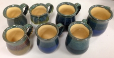 All of them glazed with the same insides and tops, but each with a different bottom glaze